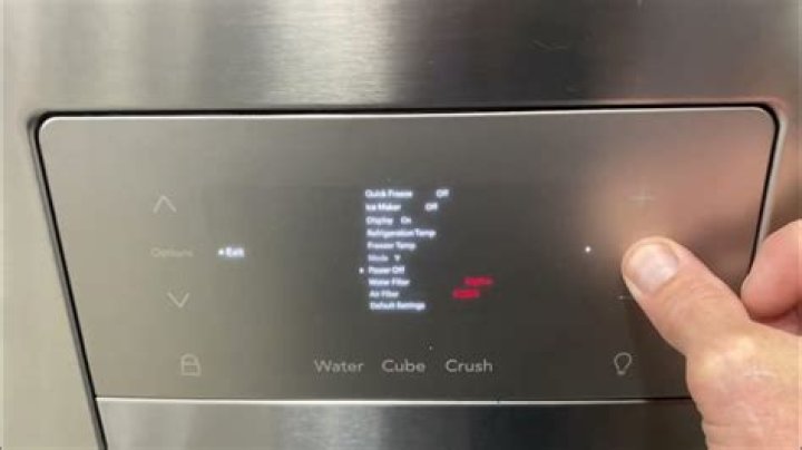 How do I change the control panel on my Frigidaire refrigerator?