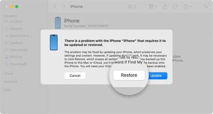 How do I restore a video from iCloud to my iPhone?