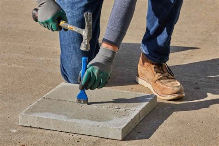 How do you cut a concrete patio slab?