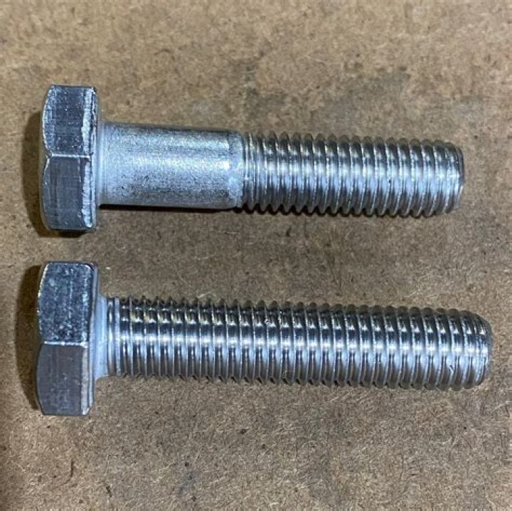 What happens if head bolts are not tight enough?