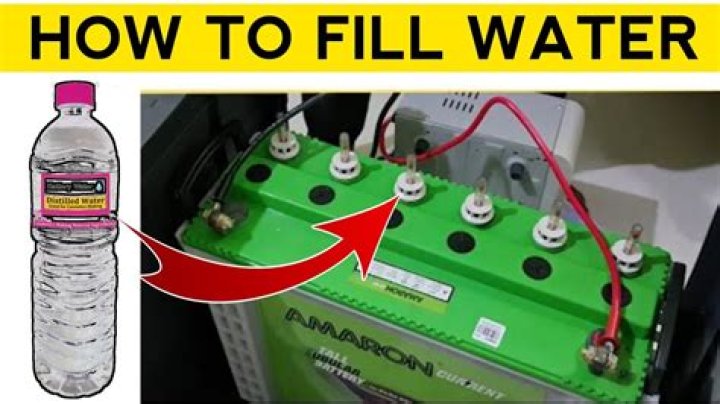 When should I fill my battery with distilled water?